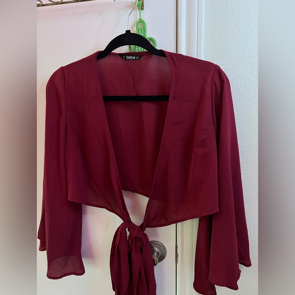Red blouse with bell sleeves